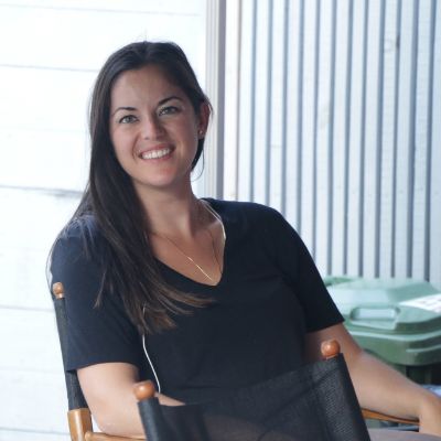 Picture of Corey Sevier's wife Katie Pragnell posing for a photoshoot wearing black color dress